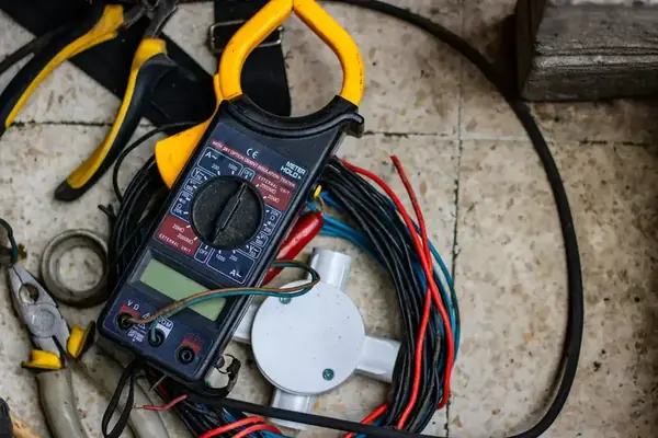 Clamp meter and electrical testing tools used for system maintenance and upgrades